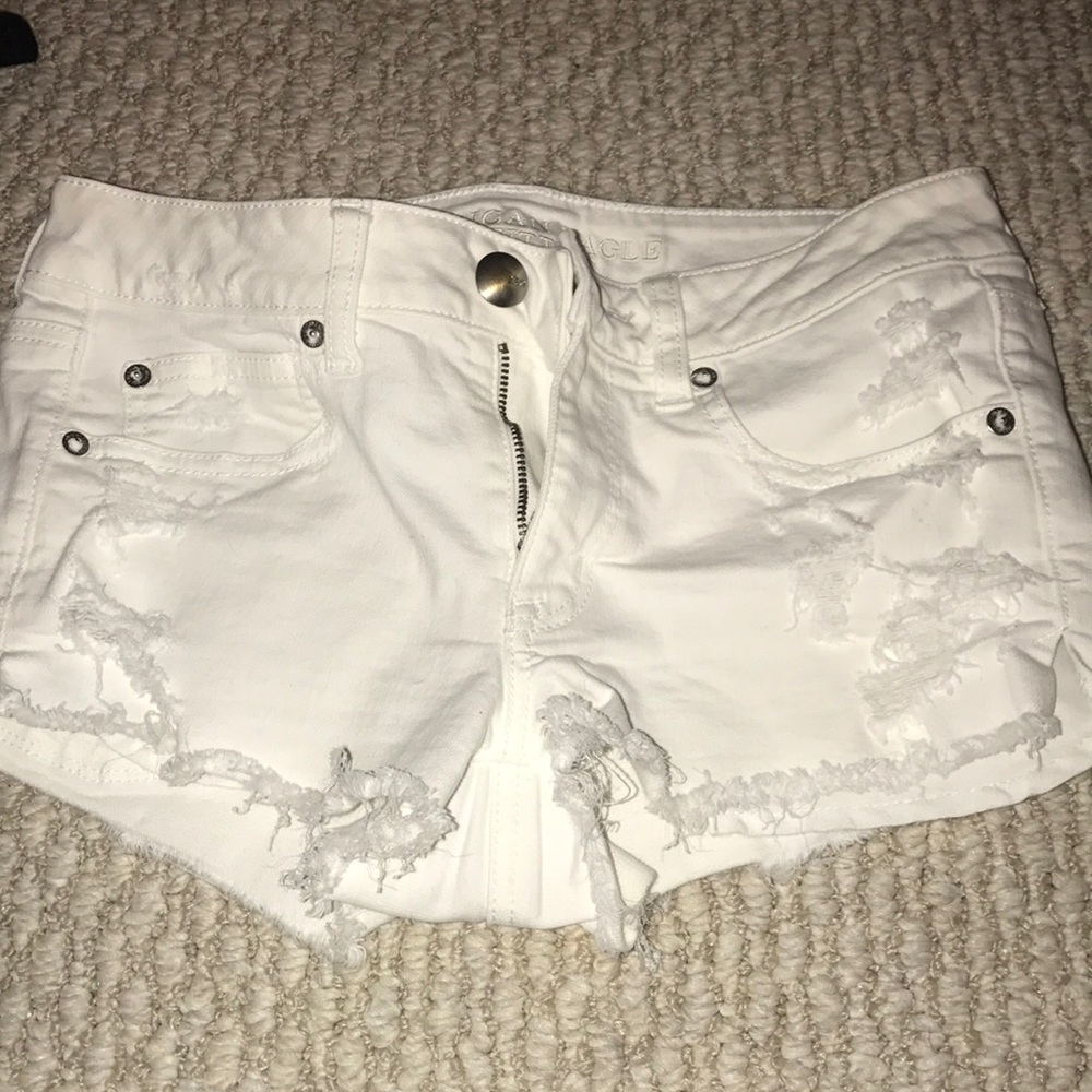 American Eagle white ripped denim shorts